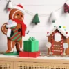 18" Fabric Gingerbread Man Holding Stocking Decorative Sculpture - Wondershop™ Brown -Wondershop GUEST e87bd029 6f07 48d8 af60 d52a988afc25